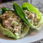 Two servings of tuna salad nestled in crisp lettuce cups, demonstrating an Easy Easiest Way Eat Healthy meal.