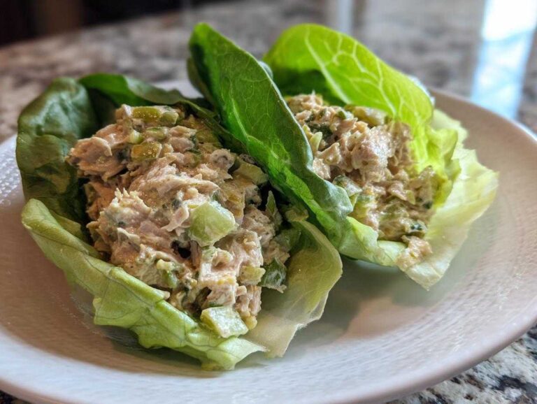 Two servings of tuna salad nestled in crisp lettuce cups, demonstrating an Easy Easiest Way Eat Healthy meal.